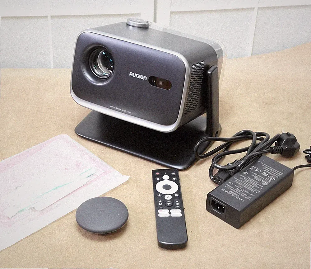 Aurzen Boom Mini 4-in-1 Smart Beamer mit Google TV, Projektor, 500 ANSI